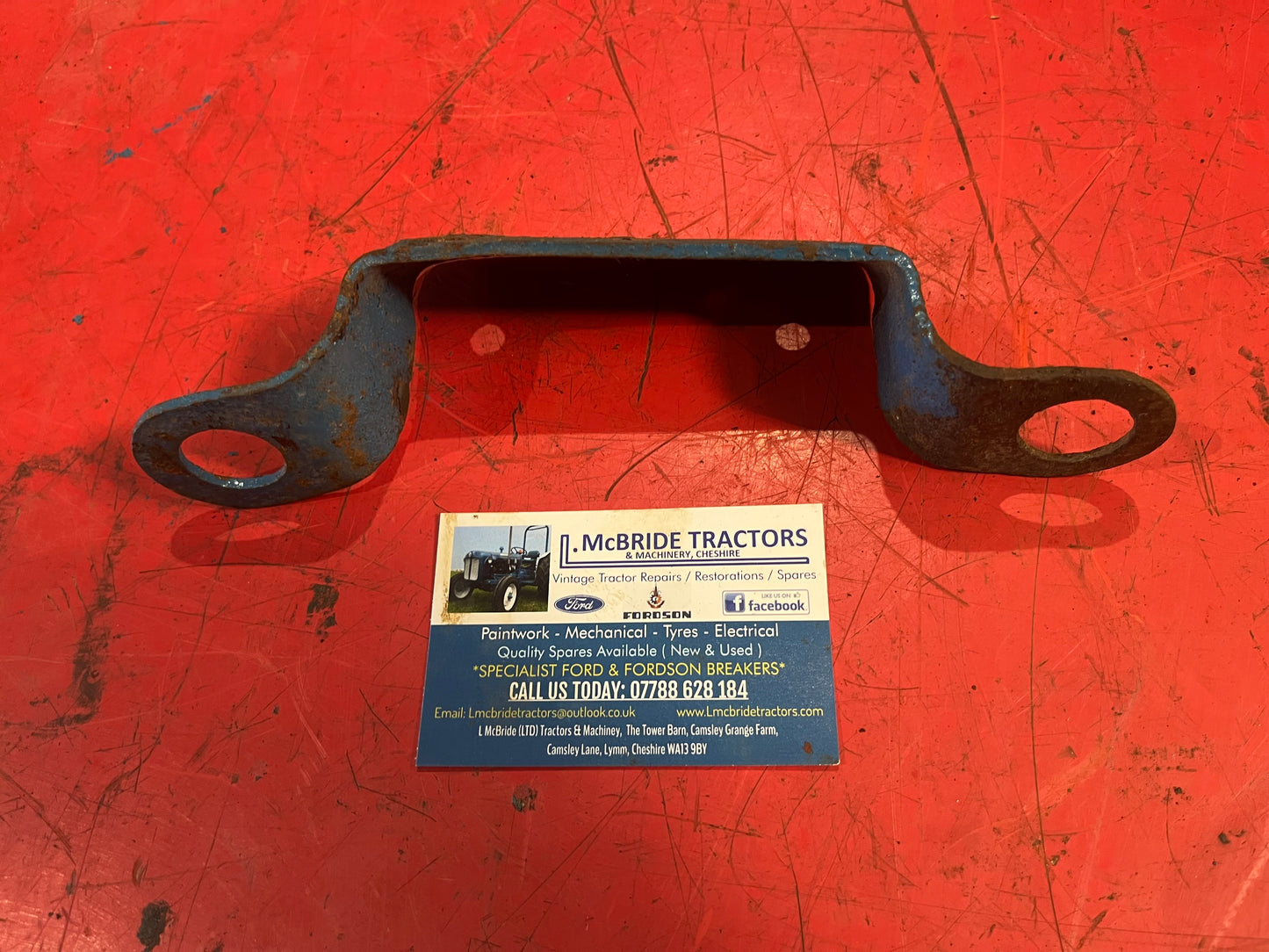 Tipping pipe bracket