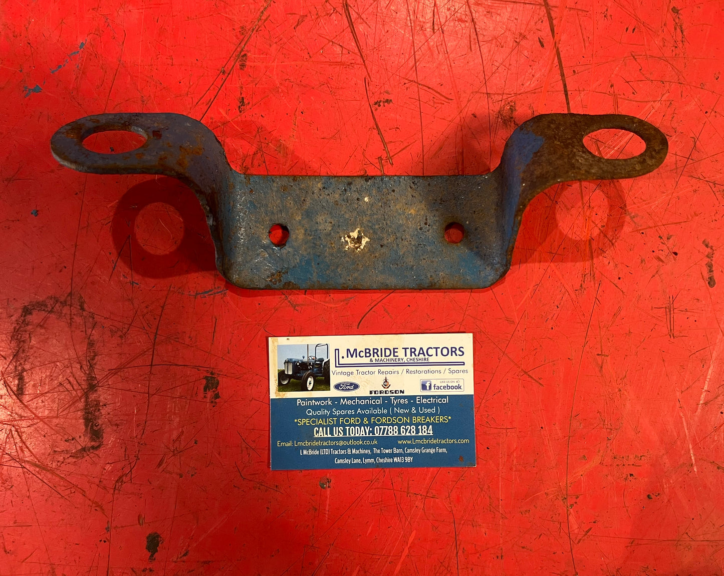 Tipping pipe bracket